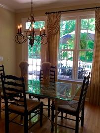 Gorgeous beveled glass top table with distressed iron base, 66"x32"