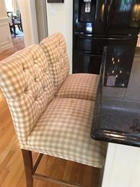 Two upholstered counter height chairs