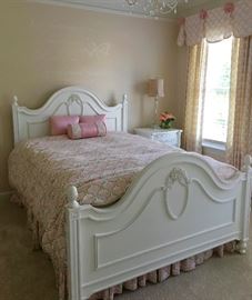 Two full sets of girls bedroom furniture. Each bedroom suite includes a double headboard & footboard with frame and rails, dresser, mirror and side table/chest. The other set also has a charming girls amoire with mirror and a double cabinet with glass shelfs. 