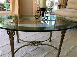 Beveled glass top table on iron base