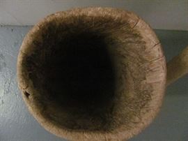 Antique wooden Native American grinding mortar (carved from cypress tree trunk) and wooden grinding pestle (Seminole). Vessel - 23 X 11, Pestle - 48 X 2.5