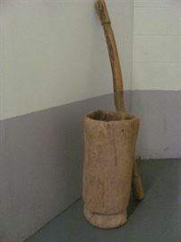 Antique wooden Native American grinding mortar (carved from cypress tree trunk) and wooden grinding pestle (Seminole). Vessel - 23 X 11, Pestle - 48 X 2.5