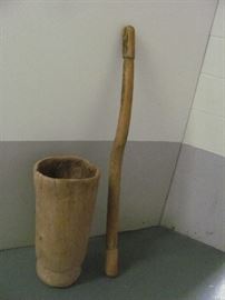 Antique wooden Native American grinding mortar (carved from cypress tree trunk) and wooden grinding pestle (Seminole). Vessel - 23 X 11, Pestle - 48 X 2.5