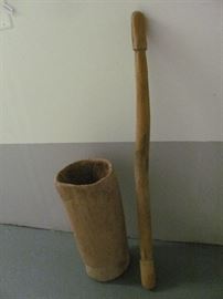 Antique wooden Native American grinding mortar (carved from cypress tree trunk) and wooden grinding pestle (Seminole). Vessel - 23 X 11, Pestle - 48 X 2.5