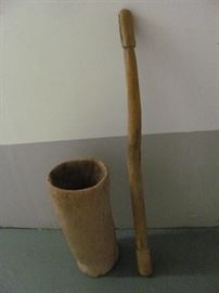 Antique wooden Native American grinding mortar (carved from cypress tree trunk) and wooden grinding pestle (Seminole). Vessel - 23 X 11, Pestle - 48 X 2.5