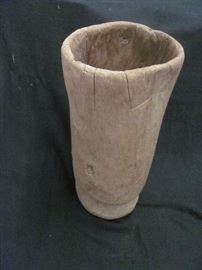 Antique wooden Native American grinding mortar (carved from cypress tree trunk) and wooden grinding pestle (Seminole). Vessel - 23 X 11, Pestle - 48 X 2.5
