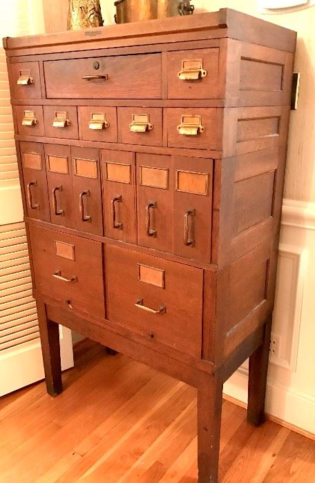 Oak Cabinet from First National Bank, Hickory NC. Really! Top center drawer is a money drawer. Included are the keys to several rooms in the old bank. In very good condition!
