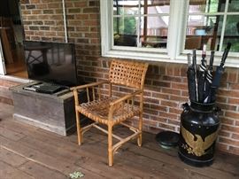 flat screen tv, milk can, chair