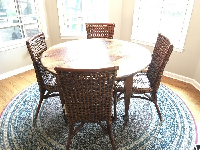 table SOLD but chairs and rug are still availableone of a kind, round dining table purchased from Bennett Galleries, made from reclaimed wood, 4 dining chairs, round wool rug
