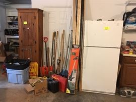 garage refrigerator, garden tools, hammer drill, Black & Decker weed eater