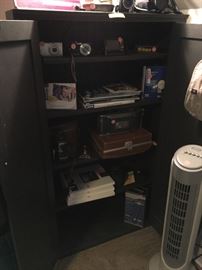 camera equipment (Casio, Canon, Polaroid land camera, Bell-Howell video camera), photo paper, etc...