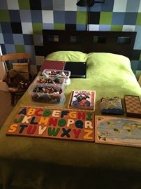 Full size bed (headboard purchased from Bliss Home)childs rocker, die cast cars