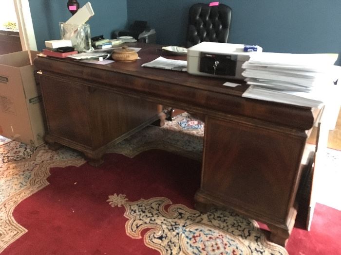 executive desk purchased from Bradens, imported, hand knotted wool rug