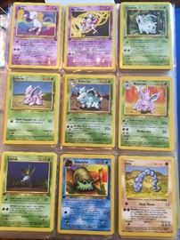 Pokémon cards total of 29 pages, many cards double and triple stacked