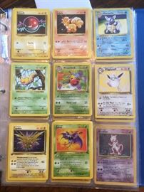 Pokémon cards total of 29 pages, many cards double and triple stacked