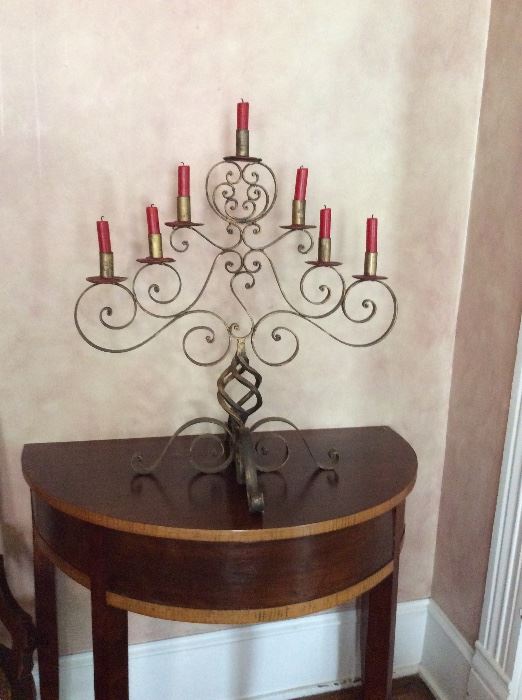 Half moon table with large brass candle holder