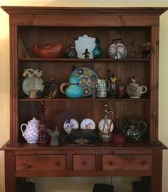Display and Storage Pine Hutch with Wizard of Oz Style Winged Monkey, Pitchers and Carafes, Bronze Monkey, End of the Day Pitcher and Tumbler, Antique Papier Mache Box, Griffin, Lucy and Ethel Carry Box; Cast Resin Armadillo; Much More