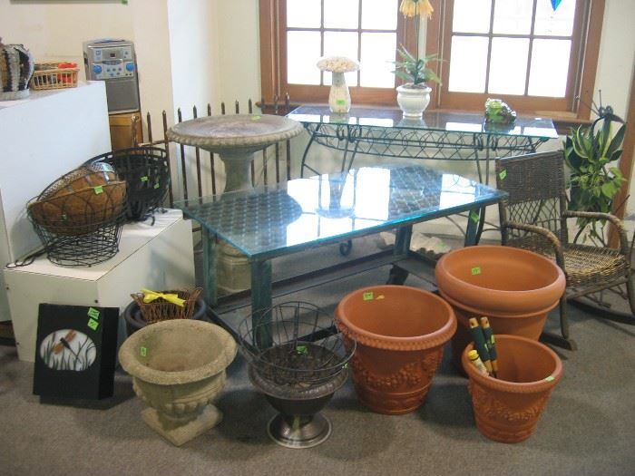 Flower pots, bird bath, baskets, child's wicker chair, metal side table with glass top, etc.