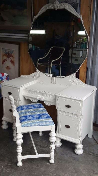 Early 1900's vanity w/stool.
Freshly painted and tastefully distressed. New foam and materil for stool top.