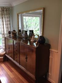 Thomasville MCM sideboard - drawers down the middle and plenty of storage on either side - very flexible piece of furniture! Not too deep!