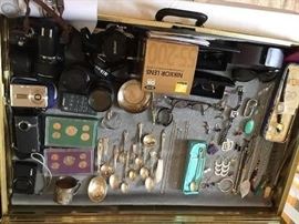 Case filled with fine jewelry, Nikon cameras, coins, sterling silver, 14 karat gold, Tiffany spoon, Tiffany earrings, iPhone 6, Oliver peoples sunglasses 