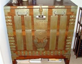 Large bandaji chest with brass strapwork and hoof-foot feet, drop-down front