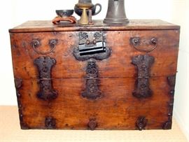 19th century small but spectacular elmwood bandaji chest with hand wrought iron hardware