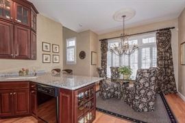 Glass Top Kitchen Table and Custom Upholstered Chairs