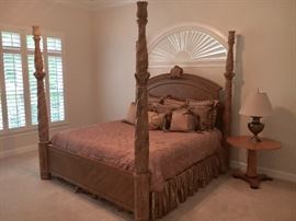 Giant, luxurious bed with custom bedding