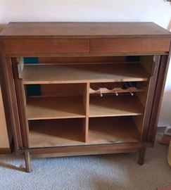 Vintage Mid Century walnut/mahogany tambour door bar cabinet.  Dimensions are 42" wide x 16" deep x 41 3/4" tall