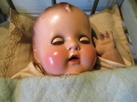 Antique Ideal Doll.  Selling with crib plus all clothing & accessories