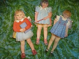 Vintage 2' paper dolls including Shirley Temple