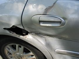 2005 Mercury Sable GS, 105,000+ miles.  Has a kiss or two on it but seems to be mechanically sound.  Available NOW for $950.  This is the biggest kiss!