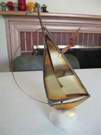 Signed Mario Jason metal sailboat on stone