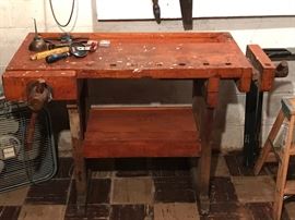 Antique wood working bench with two built in vises 