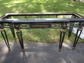 Maitland-Smith marble top with wrought iron frame and brass accents