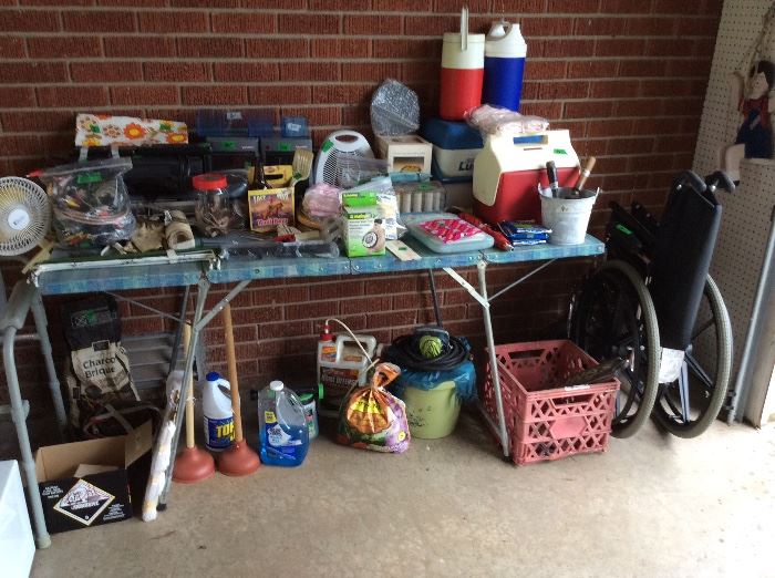 garage - cleaning supplies, another small ice chest, wheelchair (folded in corner) fans, etc. 