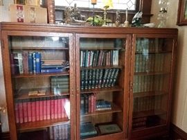 Pair oak 3 door book cases