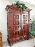 Beautiful/Unique Armoire- Made in "Indonesia".
Solid Wood "Hand carved" with plenty of detail....
"British Jacobean" style with bun feet.