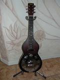 RESOPHONIC LAP GUITAR- "Lap Steel", electric.....
Manufacturer- James Beard "Dobro". (Dobro Bros. invented in 1900)
In excellent cond., includes case and stand....