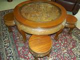 CHINESE TEA TABLE- Includes (4) matching stools, clearly "Hand Carved"...
W- 32", H- 18", Apprx. 40 years old, obviously "High End"......
The pictures don't even come close to giving this table the visual justice it deserves. In person, the carving detail, and overall visual effect is "amazing". One of the nicest we've seen.