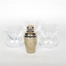 Set of Stemless Martini Glasses with Ice Bowls and Cocktail Shaker: A set of stemless martini glasses with ice bowls and cocktail shaker. This set is complete with three martini glasses with ice bowl rests. Also included is a silver tone miniature cocktail shaker.