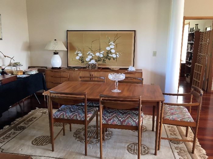 Stunning Mid Century - Long Side Board w/ Cabinets Table w/ 6 Chairs Table has 2 Self Storing leaves by Wolf & Hollander  for McIntosh Furniture Co.