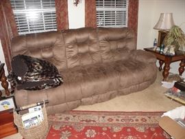 Micro suede triple reclining sofa, two matching end tables, area rug, basket, furry blanket