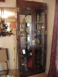 The other matching lighted display or china cabinet