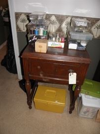 Sewing cabinet and sewing supplies
