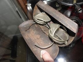 Old safety glasses in metal case