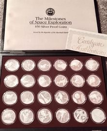 Set of 24 pure silver 50 dollar coins depicting the milestones of space exploration. 