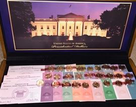 Boxed set of uncirculated presidential dollar coins.  39 presidents are represented, Washington - Carter.  