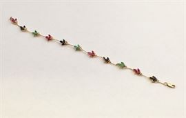 Multi-color gem stone bracelet: sapphires, emeralds, rubies and diamonds in 12K gold setting 